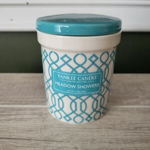 Yankee Candle Meadow Showers 7‎ oz. scented candle in a reusable ceramic jar